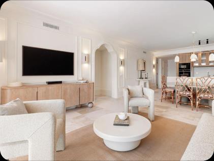 Andalucia Garden Club 60, light living and dining room with arched doorway
