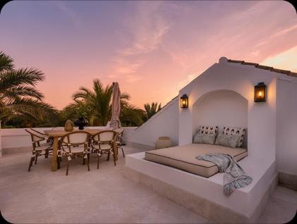 Casa Club 6A, rooftop terrace with built-in daybed at sunset
